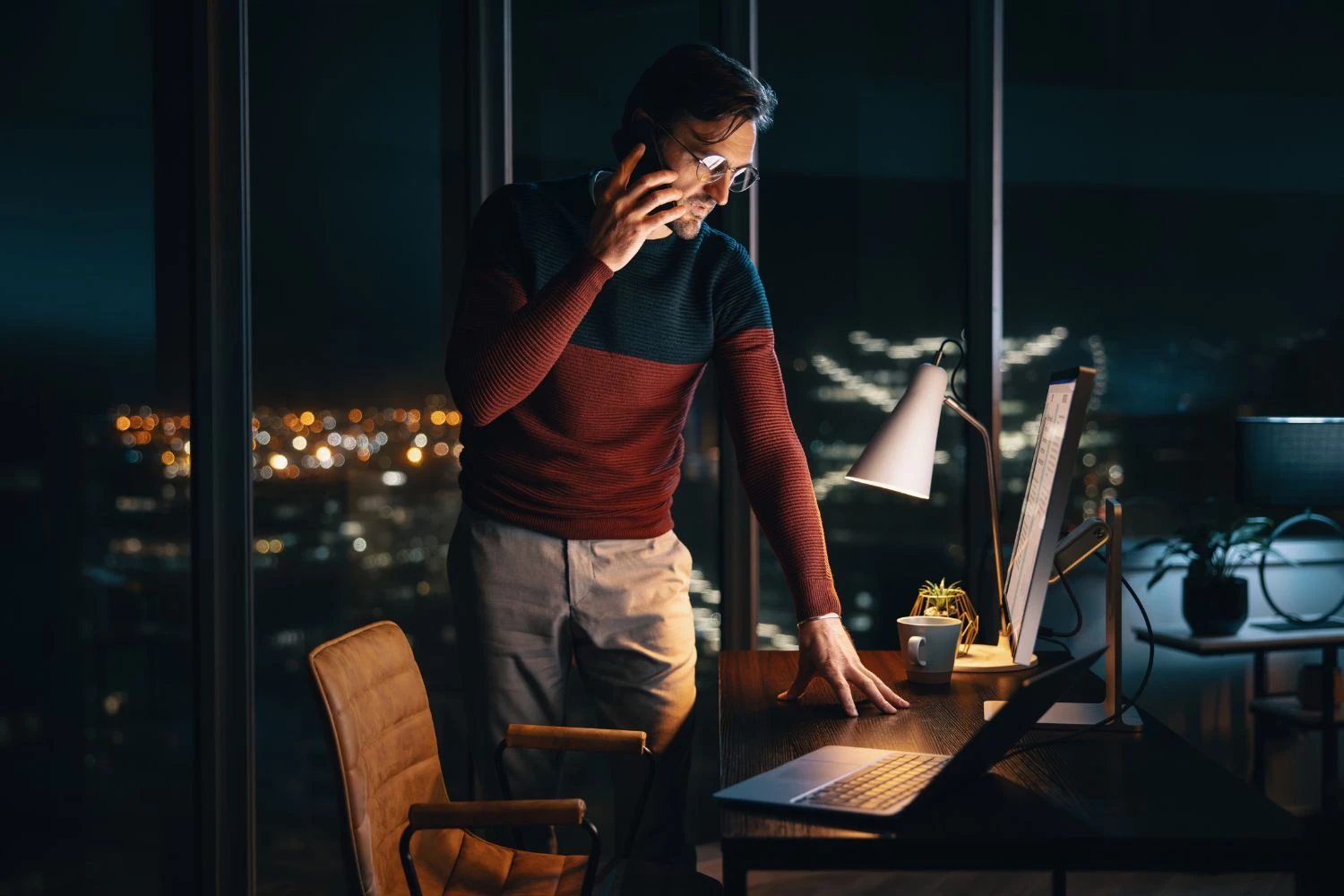 Man reviewing Mission Control AI-powered business intelligence dashboard with marketing analytics, SEO reporting, operational insights, and cross-functional team visibility